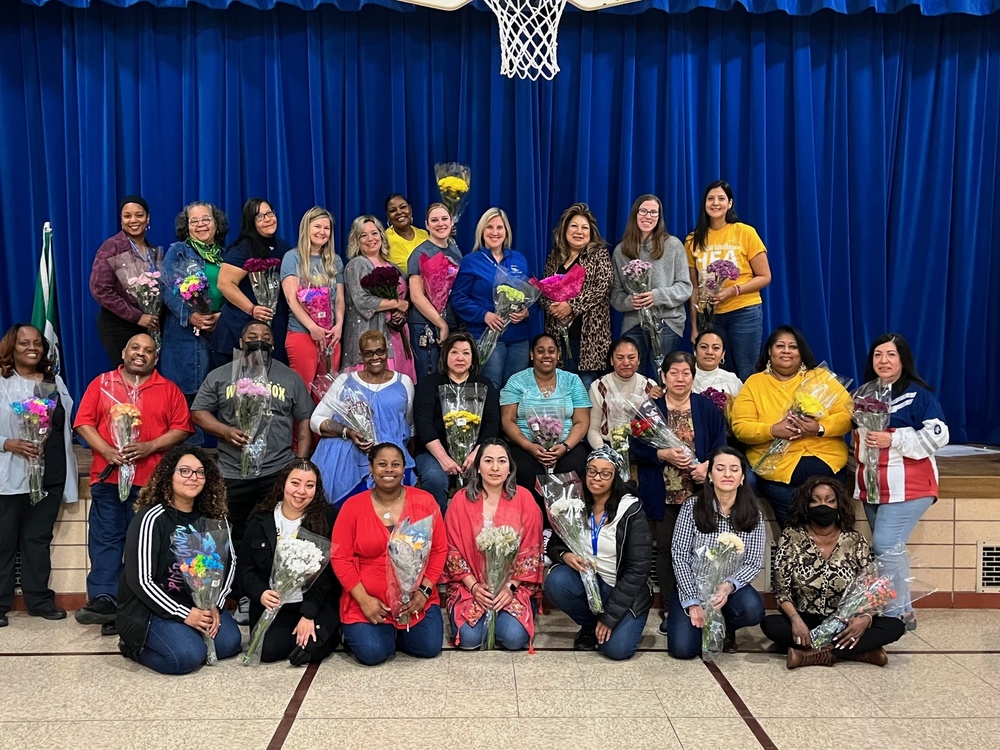 Teachers with their flowers for Teacher Appreciation Week